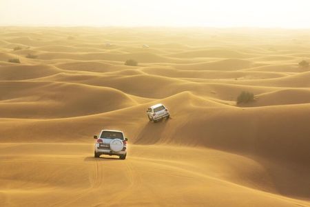 Dubai: Desert Safari With Quad Bike, Camel Ride & Dinner