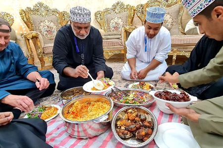 Group Dinner at Omani Home Dining Experience with Transfer