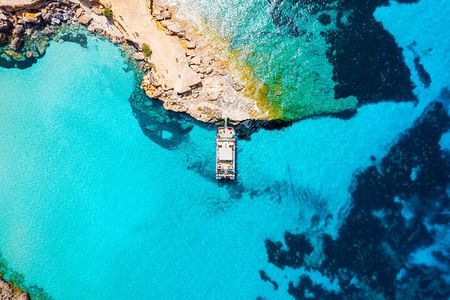 Ibiza Beach Hopping Cruise with Paddleboards, Drinks and Food 6h