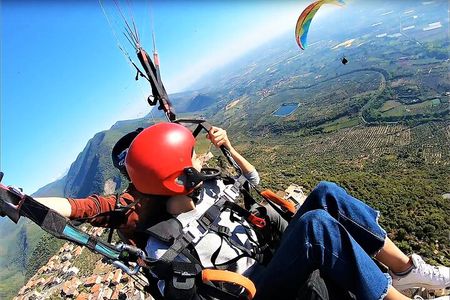 Paragliding flight over the Gardens of Ninfa