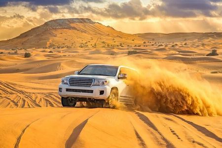 Desert Safari with BBQ Dinner and Camel Ride Experience in Dubai