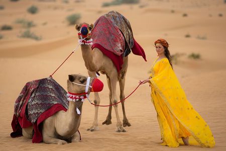Morning Red Dunes with Camel Ride, Sandboarding and Refreshments 