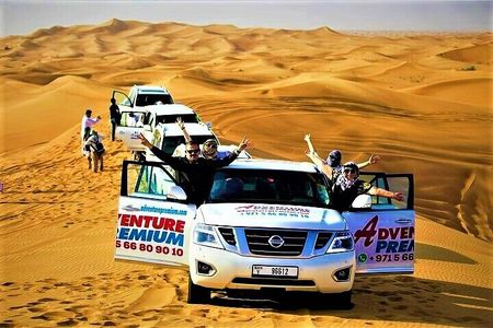 Dubai Red Dunes Camel Safari with Sand boarding, Dune Bashing & BBQ