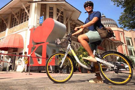 Cycling Through the Heart of Kuala Lumpur with Hotel Pickup