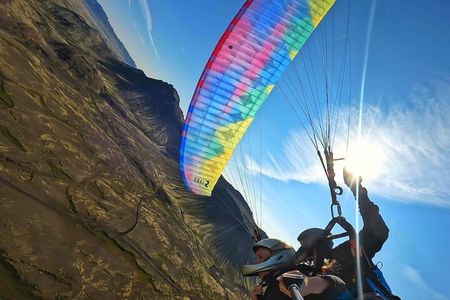 Tandem Paragliding over the Rugged Lava Fields at Blue Mountains