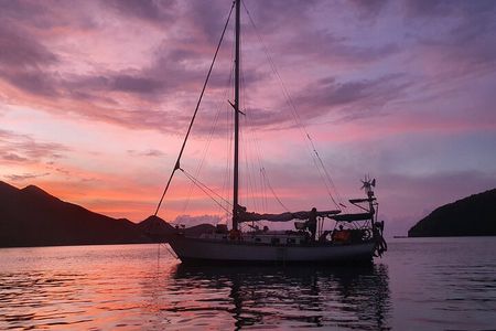 Sunset in the bay of Santa Marta in a sailboat