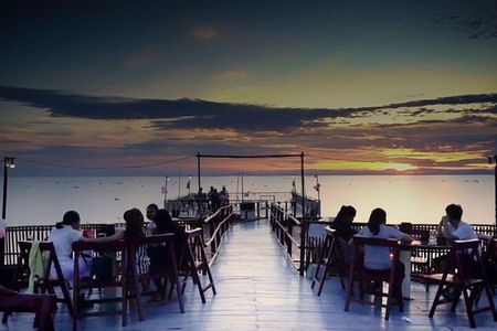 Sunset Dinner and drinks includes a Floating Village cruise tour.