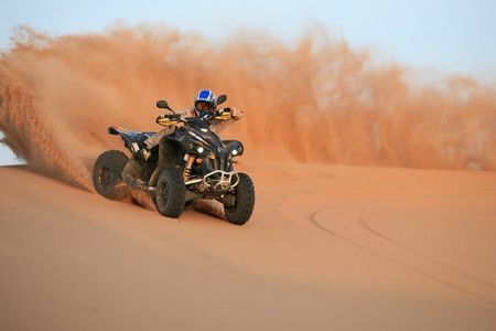 60 Min Quad Biking Tour In Dubai With Camel Ride & Sand Boarding 