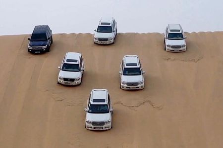 Doha Sharing Desert Safari with Dune Bashing and Sand Boarding