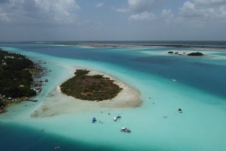 Pontoon Tour - Visit the Pirate Channel, Cenotes and Islands.