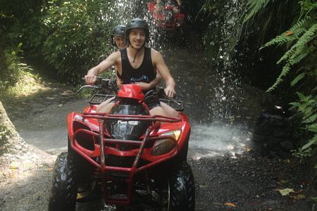 ATV Quad Bike Through Tunnel and Waterfall