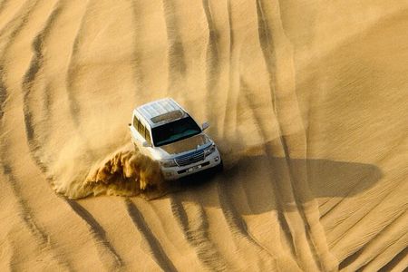 Evening Desert Safari Abu Dhabi with BBQ Dinner & Shows