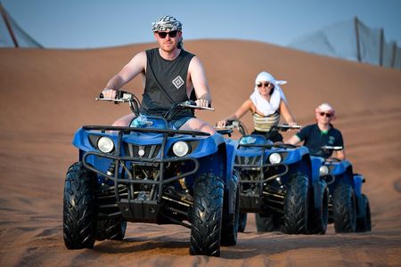 Dubai :-Morning Desert Safari, Quad Bike, Sandboard and Camel.