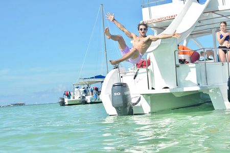Private Catamaran wonderful Snorqueling slide & entartaiment team