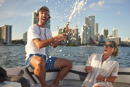 Boat Rental Miami with captain and champagne