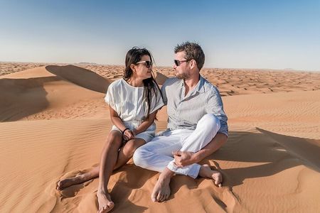 Dubai Red Dune Safari with Camel Ride, Sandboarding & BBQ Dinner