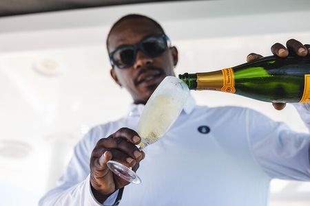 Deluxe Sunset and Saxophone Sail on Luxury Catamaran