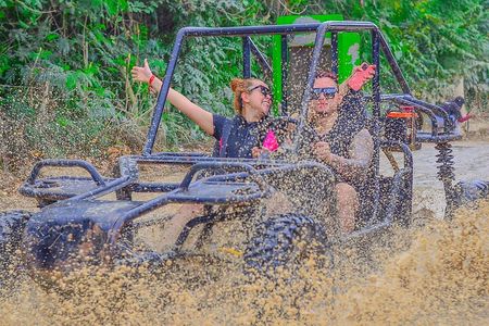 From PuntaCana: Tour in buggy double With Cenote and macao beach