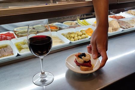 Spanish Wine and Tapas Tour in a Local Neighborhood in Barcelona 
