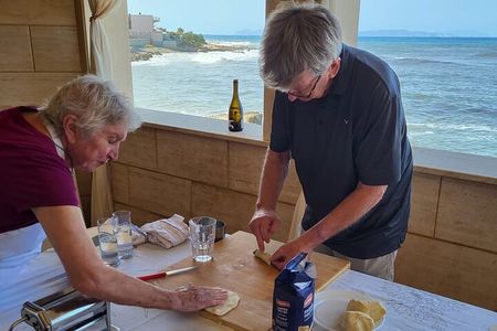 Learn how to make Sicilian traditional cannoli with sea view