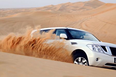 Dubai Red Dune Desert Safari: Camel Ride, Sandboarding & BBQ 