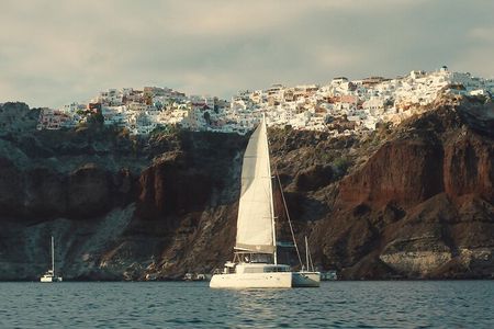 Santorini Platinum Catamaran Cruise with Meal, BBQ and Open Bar