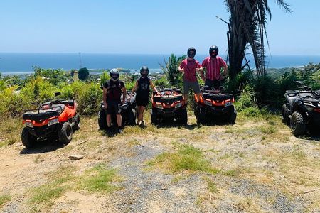 Guided ATV Tour on Mountain Dirt Road with Views of Roatan