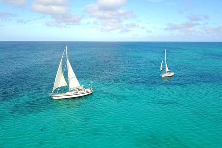 Coral Sunset Sail with 3 Course Dinner in Aruba