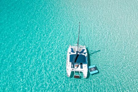 Lil Restless Private Catamaran Adventure - Snorkel SUP Cliff jump
