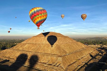 Hot Air Balloon Flight with Breakfast Cave and Pyramids Tour