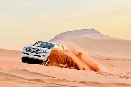 Desert Safari With BBQ Dinner, Quad Bike & Camel Ride from Dubai