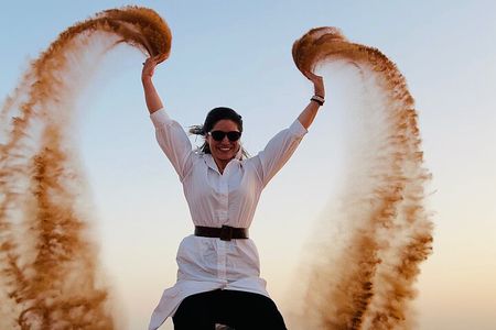 Morning Red Dune Safari with Sandboarding and Camel Ride