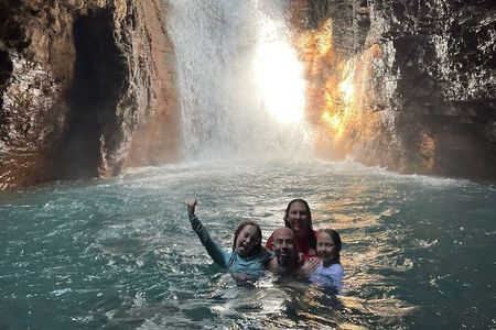 Water Adventure: La Leona Waterfall, River tubing & Cliff jumps