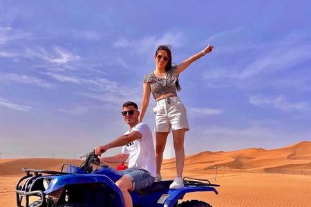 Arabian Desert Safari And BBQ Dinner Red Dunes with Camel Riding 