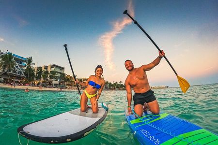 Sunset paddleboard group session Caribbean Sea. Foto's included!
