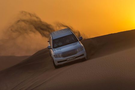 Dubai Red Dune Desert Safari, Camel Ride, Sandboarding, & BBQ