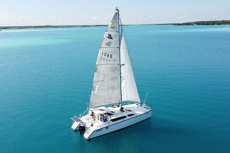 Catamaran Adventure: Sailing and Swimming in the Bacalar Lagoon