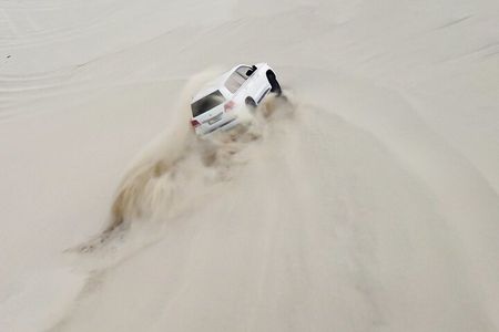 Private Night Desert Safari Dune Bashing and Camel Ride in Doha