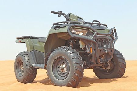 Desert Safari with Quad Bike, Camel Ride, Sand Surf, BBQ & Shows