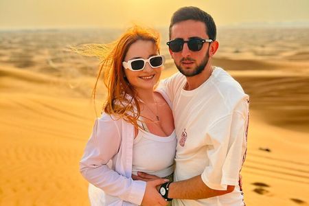 Dubai Dune Bashing Tour with Quad Bike, Sandboarding, Camel Ride