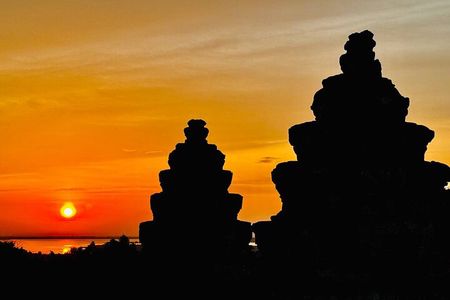 Exploring the Ancient Wonders of Angkor Wat with sunset backheng