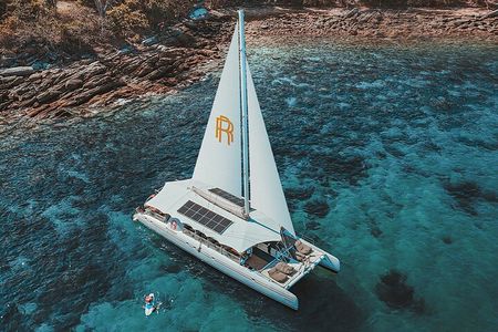 Rhapsody Phuket Coral & Racha Sunset Catamaran Cruise