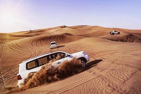 Morning Desert Safari Camel Ride Dune Bashing and Sand Boarding