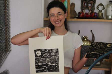 Print a work of art with a local artist for your home.