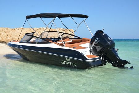 Dolphin watching & snorkelling by a private Speedboat in Hurghada