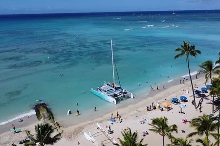 Board from Waikiki Beach for a scenic Sunset Sail on the Hāwea