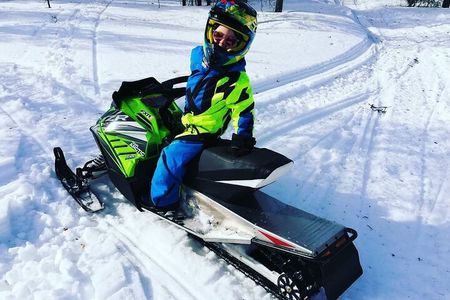 Lapland Winter Park Mini snowmobile fun for kids in Rovaniemi