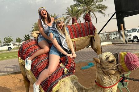 Dubai Red Dune Desert Safari Camel Ride Sandboard & BBQ Dinner