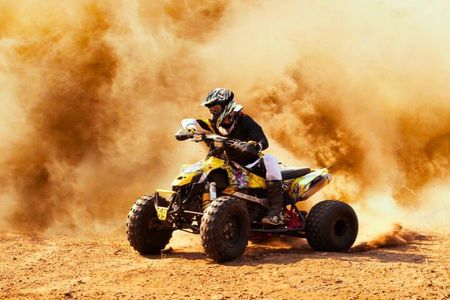 Premium Dubai Desert Safari with Quad Bike Camel Ride BBQ & Shows