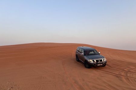 Evening Desert Safari, Camel Ride, Sand Boarding & BBQ Dinner 